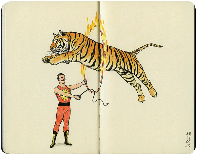 Dompteur mit einem Tiger, der durch einen Feuerreifen springt